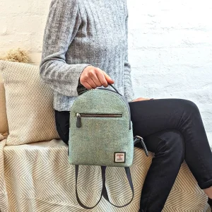 Turquoise Herringbone Harris Tweed Backpack with grey began leather tripm