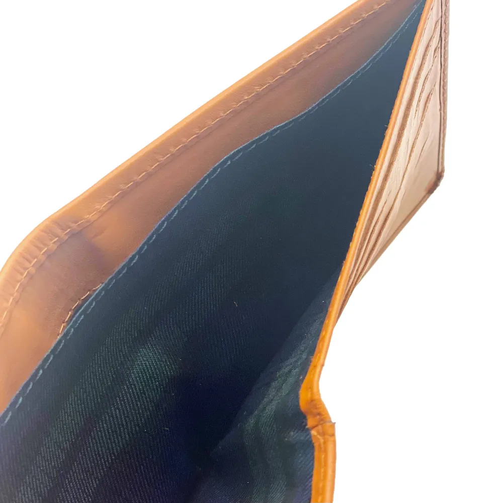 tartan lining inside tan leather slim bifold wallet